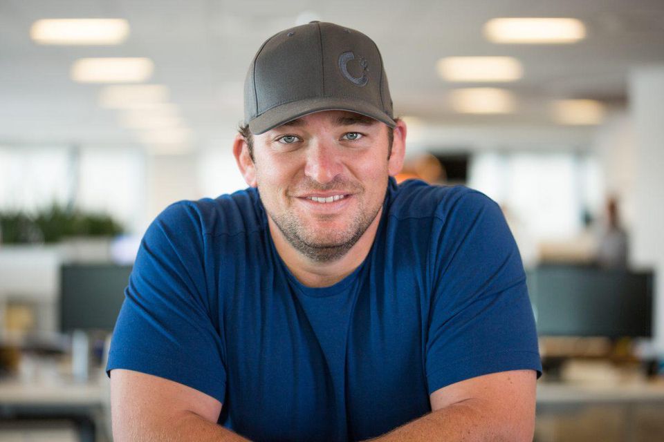 Man in front of a blurred background