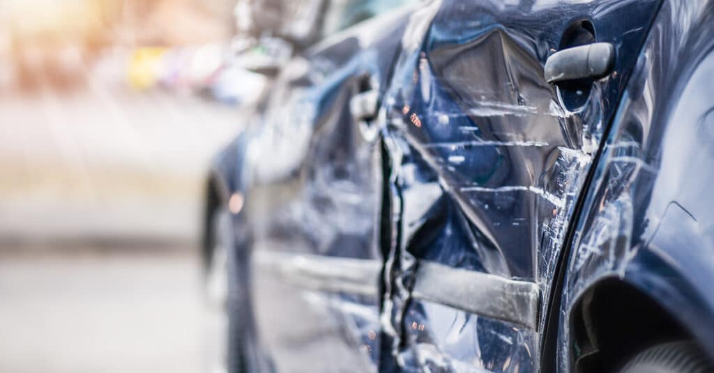 image of damaged vehicle evoking driver safety trends