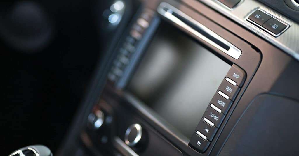 photo of vehicle infotainment center evoking GM Removing Apple CarPlay and Android Auto