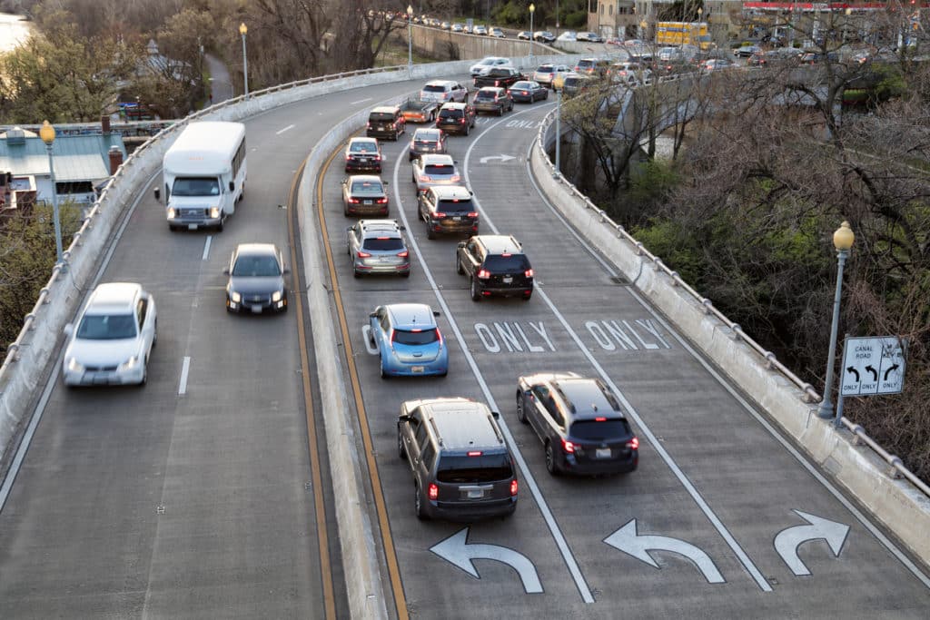image of vehicles driving on highway, evoking accountable Car Allowance Plan