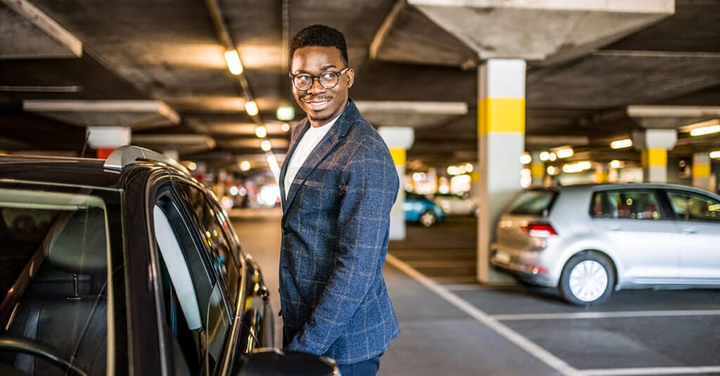 businessman about to open door to vehicle evoking transitioning from fleet to favr