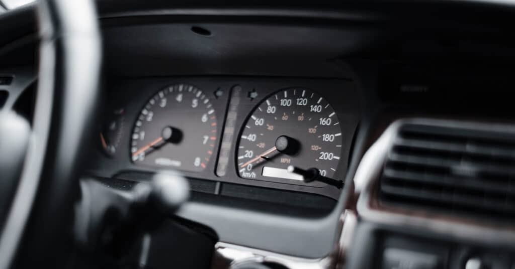 image of vehicle dashboard evoking variations in odometer readings