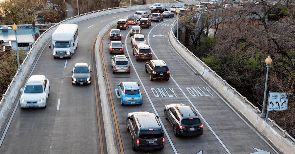 image of vehicles traveling road evoking accountable car allowance