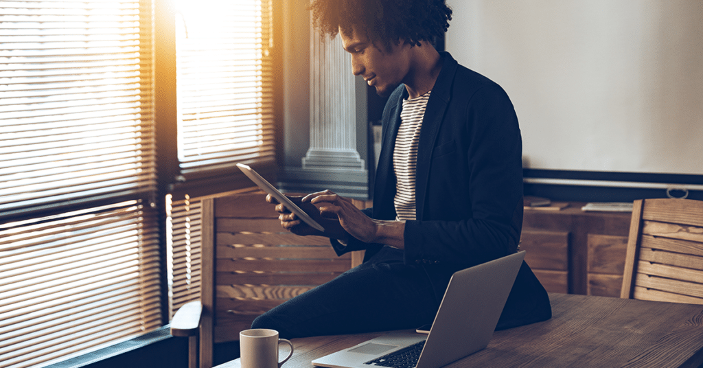 business man working on tablet evoking Bring Your Own program