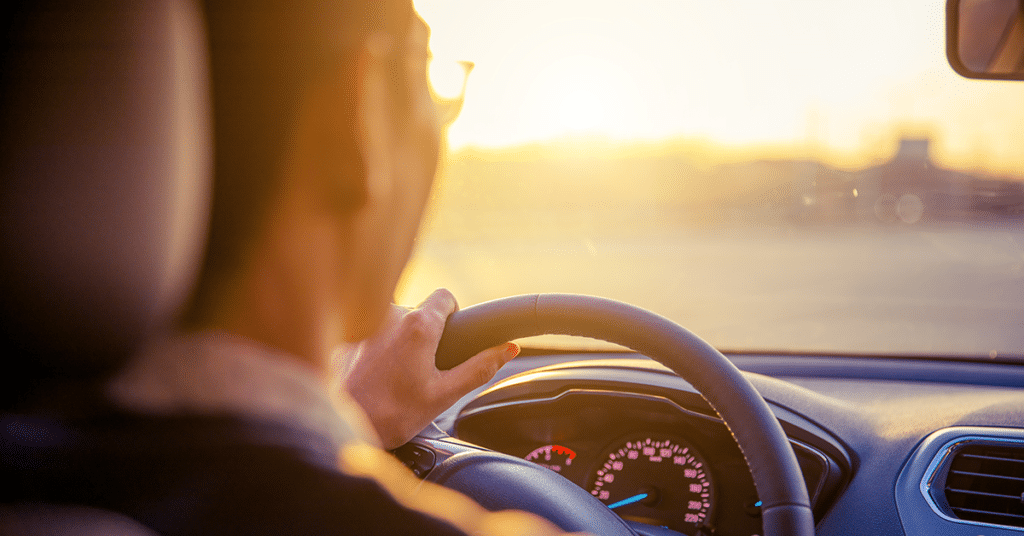 image of person behind the wheel of a vehicle evoking FAVR example