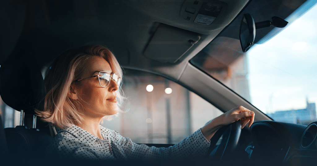 image of business person behind wheel evoking FAVR program requirements